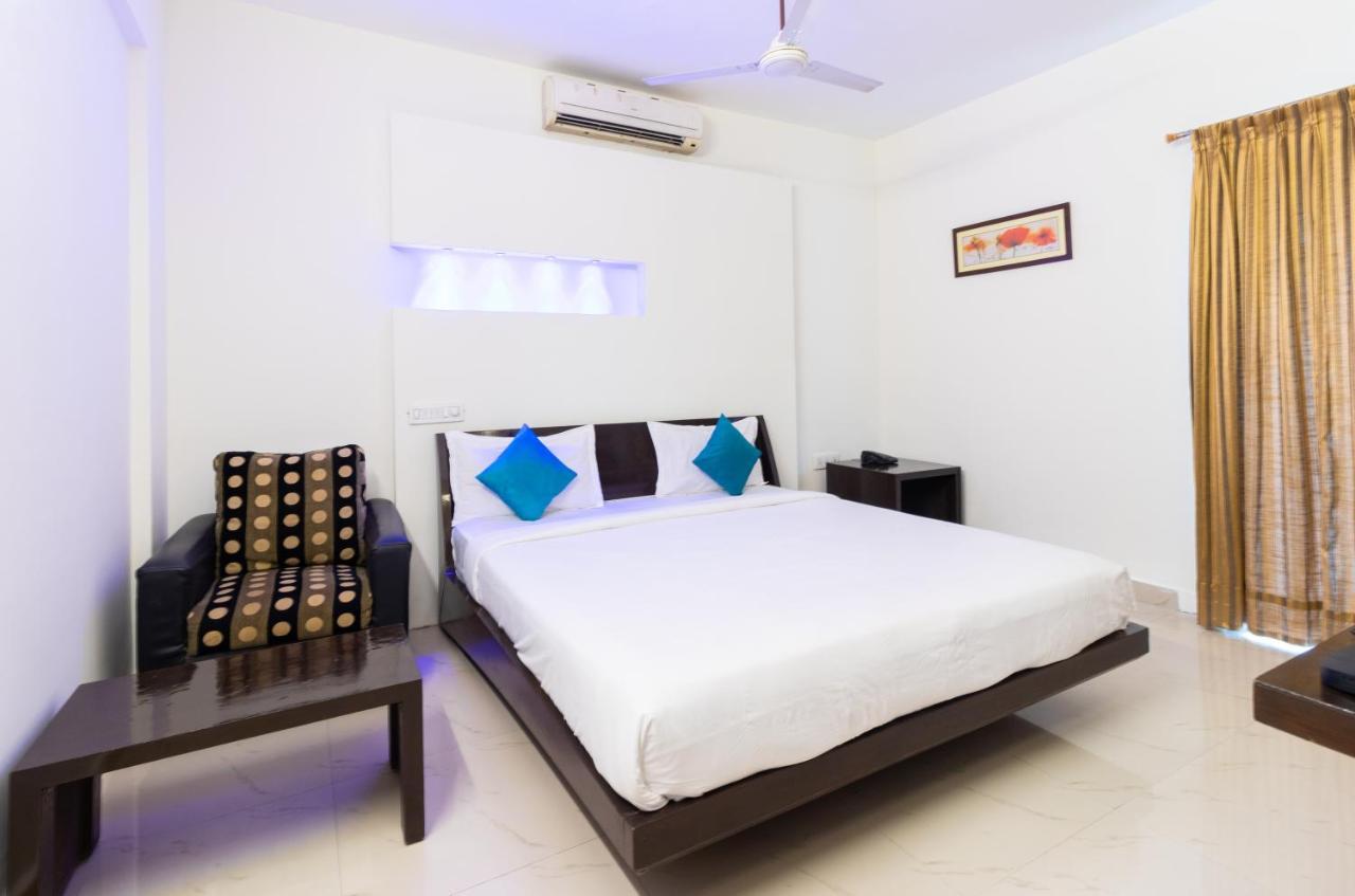 Sanctum Suites Domlur Bengaluru Szoba fotó